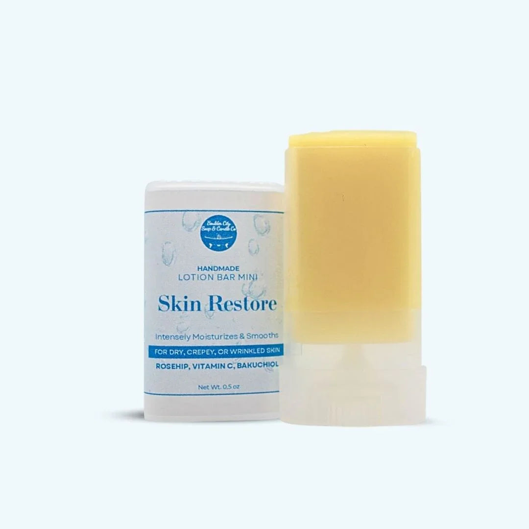 Open Skin Restore Lotion Bar Mini showing solid balm texture for targeted moisture on dry skin.