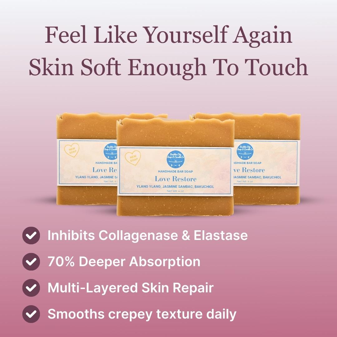 Three bars of Love Restore handmade soap by Boulder City Soap with checkmarks highlighting benefits like inhibiting collagenase, 70% deeper absorption, and smoothing crepey skin texture for women over 45.